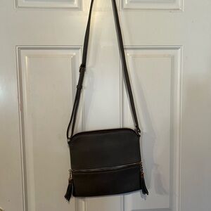 Stylish Black Crossbody Bag with Tassels